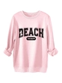 Close-up of the vintage BEACH THERAPY print on a pink crewneck cotton sweatshirt - Pink