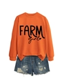 Flat lay detail of orange Farm Girl sweatshirt with ripped denim shorts set - Orange (Black Font)