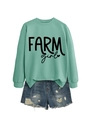 Detail of mint green sweatshirt with FARM girl text and distressed denim shorts - Light Green (Black Text)