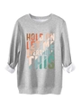 Détail du slogan imprimé coloré sur un sweat gris à manches longues et poignets roulés - S / Gris clair