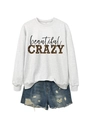 Flat lay of a grey sweatshirt featuring crazy leopard print text and denim shorts - Off-White (Black Graphic)