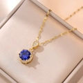 Retro gold titanium necklace featuring a round emerald blue gemstone pendant with diamonds - Gold/Blue Zirconia