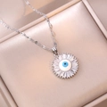 Collar de plata con colgante de ojo de girasol y circones en caja de joyas champán - X0194 Ojo Azul