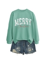 Detail of mint green Merry Christmas sweatshirt and distressed denim shorts set - Light Green Sweatshirt And Shorts