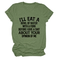 Close-up of grass green cotton t-shirt featuring bold black slogan print on the chest - S / Olive Green (Black Text)