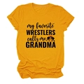 Detail view of cotton t-shirt with black graphic text and wrestler silhouettes on yellow - S / Mustard Yellow
