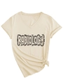 Detail of beige V-neck radiology T-shirt showing fabric texture and stylish knotted hem - S / Sand (Black Font)