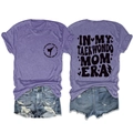 Detail of Taekwondo Mom Era graphic print on purple cotton t-shirt with vintage typography - Purple (Black Font)