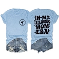Detailed front and back view of Taekwondo Mom Era graphic tee and denim shorts - Light Blue (Black Font)