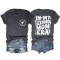 Flat lay of gray T-shirt with Taekwondo Mom Era graphic and denim shorts set - Heater Grey (White Font)