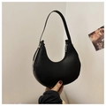 Detail of minimalist black hobo shoulder bag featuring matte leather and silver hardware - Black
