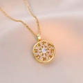 Golden spinning snowflake necklace with sparkling zircon crystals on elegant beige satin fabric - Gold Radiating Rotating Snowflake Style (X0592)