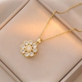 Elegante collana con ciondolo a fiore rotante dorato con opale e pietre di zircone - Fiore Rotante in Zircone (X0625)