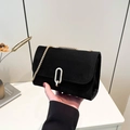 Chic black matte flap crossbody bag with gold U-shaped buckle and chain strap - Black