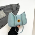 Chic light blue woven shoulder bag with gold twist lock and smooth leather texture - Blue