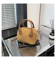 Ginger yellow corduroy textured bowling bag with brown leather handles and shoulder strap - Brown