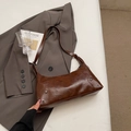 Vintage dark brown leather underarm bag with metal rivets and adjustable strap - Coffee