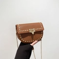Brown litchi texture saddle bag with gold studs and metal chain shoulder strap - Brown