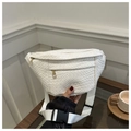 Detailed view of white woven texture on crossbody bum bag with golden zippers - White