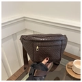 Close-up of a dark brown woven waist bag with golden zipper and adjustable nylon strap - Coffee