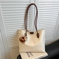 Minimalist beige tote bag with brown straps and cute plush monster charm accessory - With Charm / White