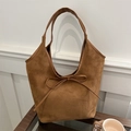 Brown suede tote bag with delicate bow detail and leather handles for commute - Brown