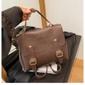 Dark brown vintage PU leather backpack with COIN 70D embossed text and bronze buckles - No Pendant / Brown