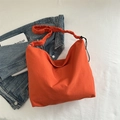 Minimalist bright orange drawstring pleated crossbody bag in cotton canvas material - Orange