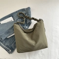 Olive green drawstring pleated crossbody tote bag with a soft ruched shoulder strap - Green