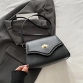 Borsa a spalla minimalista in similpelle nera con chiusura girevole ovale dorata elegante - Nero