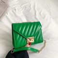 Green leather crossbody bag with V-quilted stitching and elegant gold metal clasp - Green