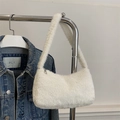 Chic white faux fur shoulder bag with soft plush texture and silver metal zipper closure - White