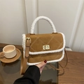 Brown suede crossbody bag with white shearling trim and gold twist-lock closure - Brown