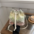 Colorful tassel bucket bag with woven star patterns and stylish fringe details - Star - Rainbow
