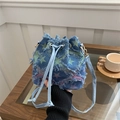 Blue denim bucket bag with frayed star patterns and drawstring closure for women - Star - Rainbow