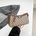 Borsa sottobraccio vintage in pelle marrone e tela con fibbia a camelia dorata - Marrone