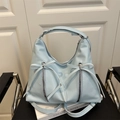 Light blue faux leather tote bag with white bows, zipper accents and cat face pattern - Blue