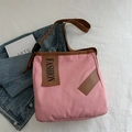Borsa tote in tela rosa con dettagli in pelle marrone ed etichetta moda in piano - Rosa