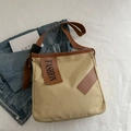 Borsa tote in tela kaki con finiture in pelle marrone e targhetta fashion chic - Cachi