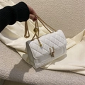 White quilted chain crossbody bag with adjustable gold-tone sphere and metal turn-lock - White
