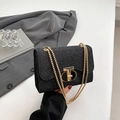 Sac à main noir scintillant élégant avec texture pailletée et bandoulière chaîne dorée - Noir