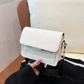Minimalist white crossbody square bag with wide black nylon strap for casual use - White