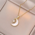 Collier doré avec pendentif étoile et lune en nacre présenté dans un écrin à bijoux - Blanc (X2892)