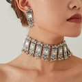 Vintage silver jewelry set featuring a geometric gemstone choker and drop earrings - White