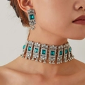Detail of vintage silver choker and earrings set with emerald green stones and tassels - Emerald Green