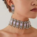 Close-up of vintage silver choker and earrings set featuring purple gemstone detailing - Purple