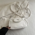 Elegant white bow shoulder bag in smooth faux leather with silver metal ribbon detail - White