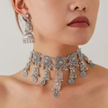 Vintage bohemian jewelry set with silver choker necklace and matching dangle earrings - White