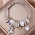 Silver cable bracelet with sparkling bear charm, colorful heart and handmade tag - White