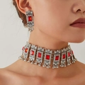 Vintage jewelry set with antique silver choker and red gemstone earrings on model - Red
